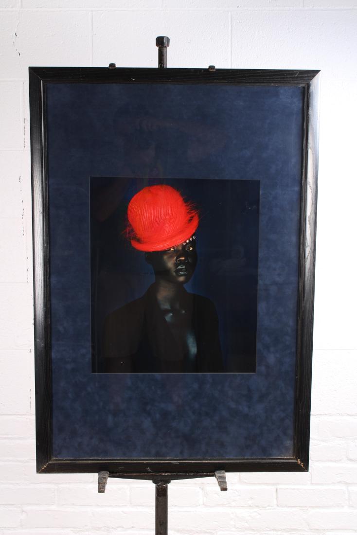 Fashion Photography Portrait: Fashion Photography Portrait. Ebony model with red hat.