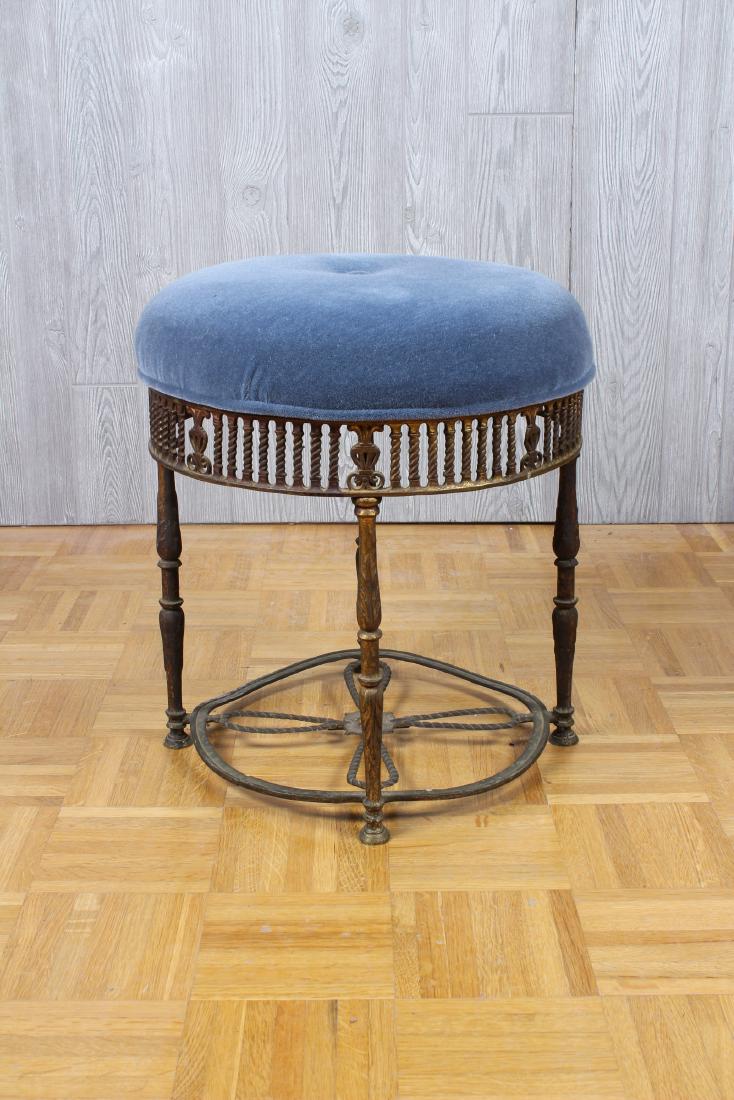 Oscar Bach Bronze Stool: Oscar Bach Bronze stool with mole hair upholstered seat over open column form apron supported on 4 legs with ornate stretcher. Break in lower stretcher over all patination from age. Size: 18 1/2" x 16