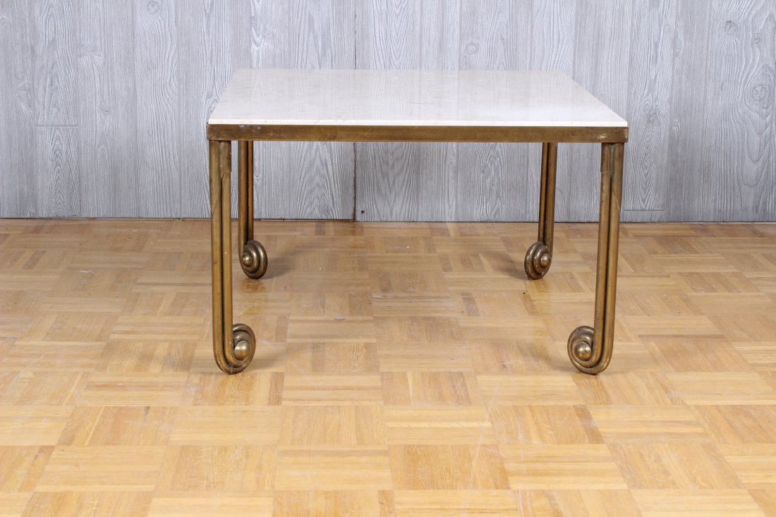 Bronze mid century modern side table: Well designed bronze mid century modern side table with a polished travertine stop supported on bronze scrolling base. Circa 1950-60. Unknown designer, great quality. Size: 16 1/2" H x 25" W x 25" D