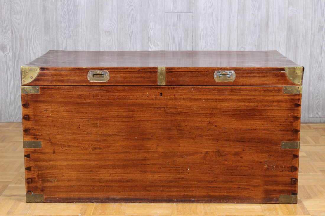 Good 19th C English camphor wood campaign trunk: Good 19th century English camphor wood campaign trunk with brass mounts and hardware. Size: 19" H x 37" W x 20" D