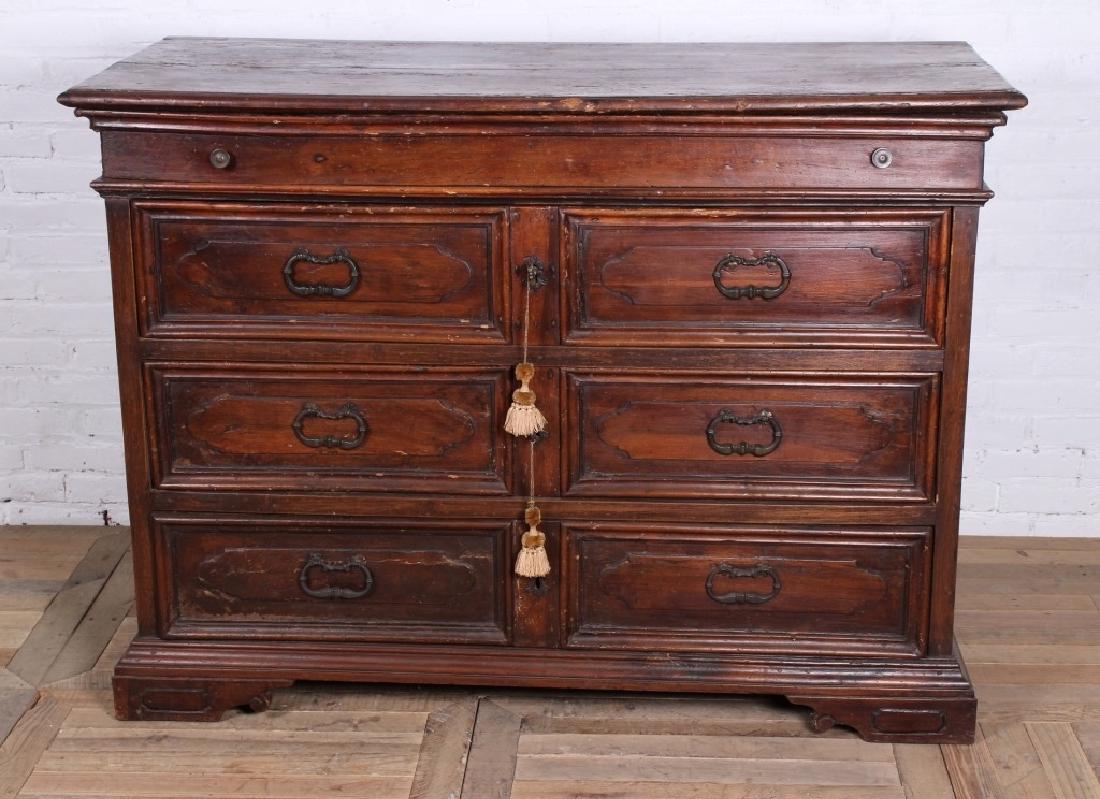 Antique Italian Walnut Commode: A very good Italian walnut late 17th and 18th C commode having one blind drawer over 3 long paneled front drawers all raised on bracket feet. Size: 41 x 57 x 23.75.