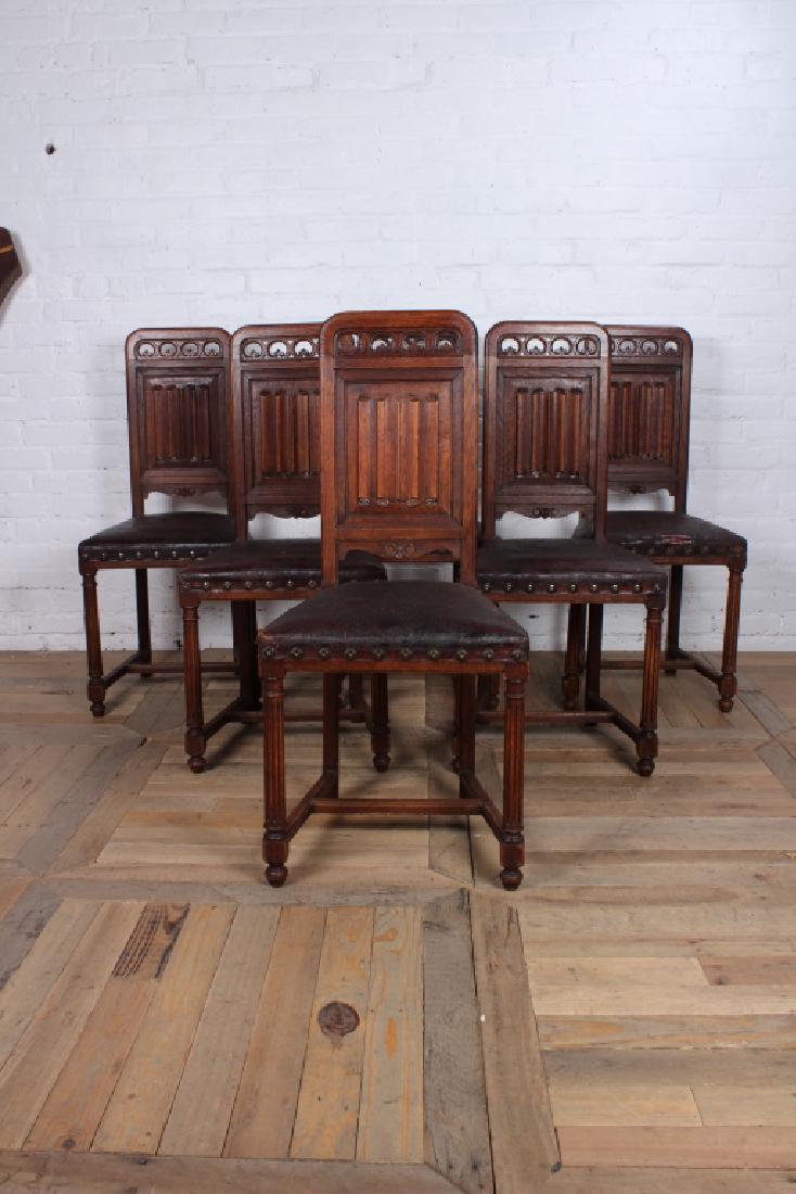Set of 6 French Gothic Revival Chairs: Set of 6 French Gothic Revival labeled Geoffe + Jeune Paris Carved oak linen fold decorated chairs retaining original leather seats. Size: 38 1/2" H x 17" W, 15 1/2" D, Seat Height: 18"