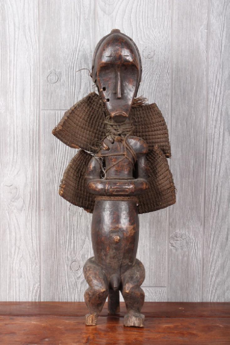 Fang Culture Winged Fetish: Fang Culture Winged Fetish. African. Carved wood, basketry. Size: