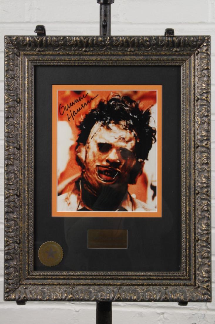 Signed Glossy Still from Texas Chainsaw Massacre: Gunnar Hansen autographed (with COA) glossy still from "The Texas Chainsaw Massacre" 1971 in which he starred as Leatherface. Hansen is a legendary star of many horror films and he has 29 roles to his