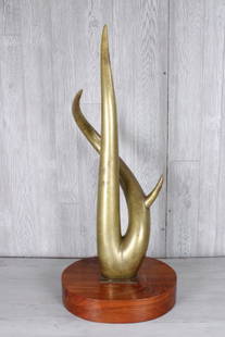 Raymond Granville Barger (1905-2001) "Growth": Raymond Granville Barger (1905-2001) early bronze sculpture titled "Growth" signed and dated "Barger 1939"- A natural bronze form mounted on walnut base. Size: 36" H x 12" W x 9" D, With base 39 