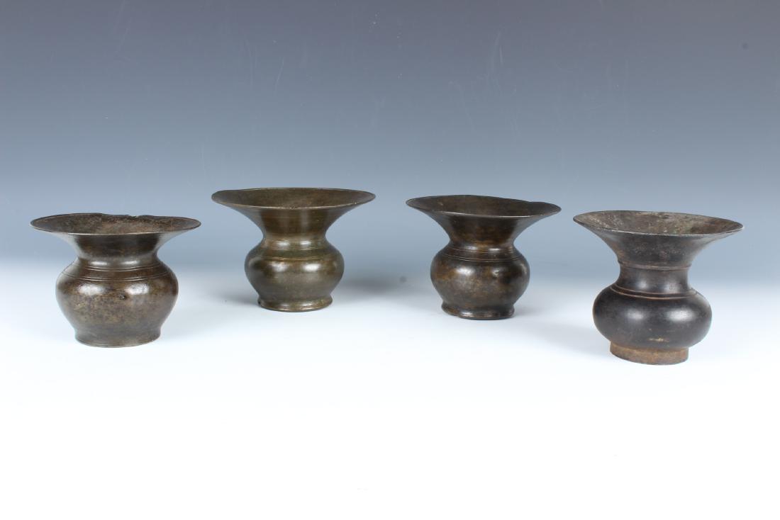 4 Antique Bronze Cambodian Lotas: 4 Antique Bronze Cambodian Lotas. Size: Tallest: 4" Tall