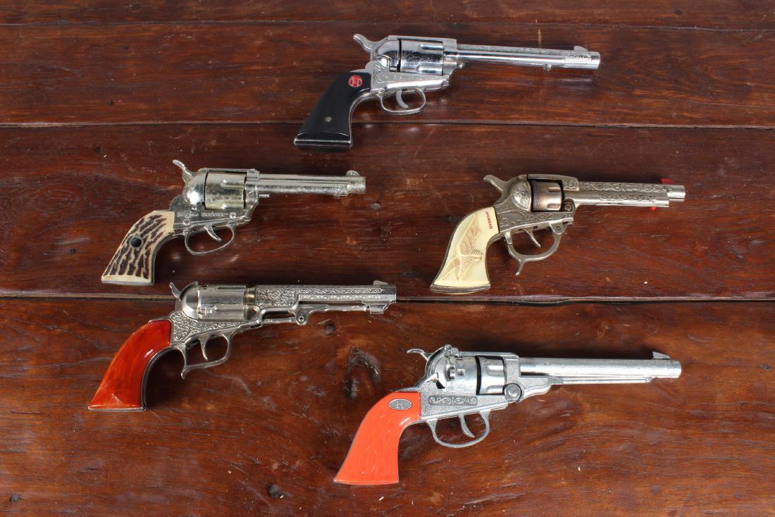 Group of 5 Vintage Toy Cap Guns: Group of 5 Vintage Toy Cap Guns. Including Hubley and Nichols. Size: 12" x 5" x 1.5"