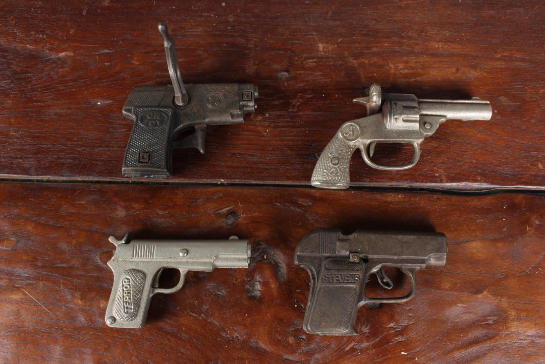 Collection of 4 Vintage Toy Cap Guns: Collection of 4 Vintage Toy Cap Guns. Including the Terror, and the Oh Boy. Size: 5.5" x 3" x 1"