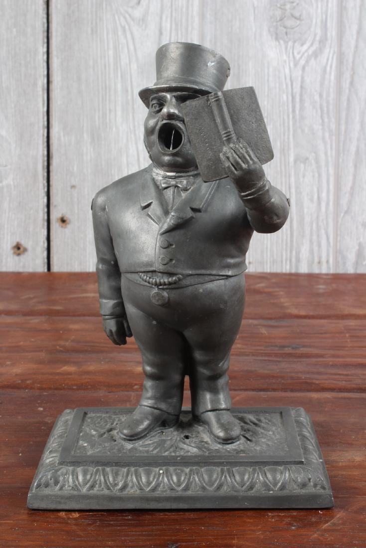 Mechanical Figural Politician Cigar Cutter: Mechanical Figural Politician Cigar Cutter. Size: 8" x 5" x 3.5"