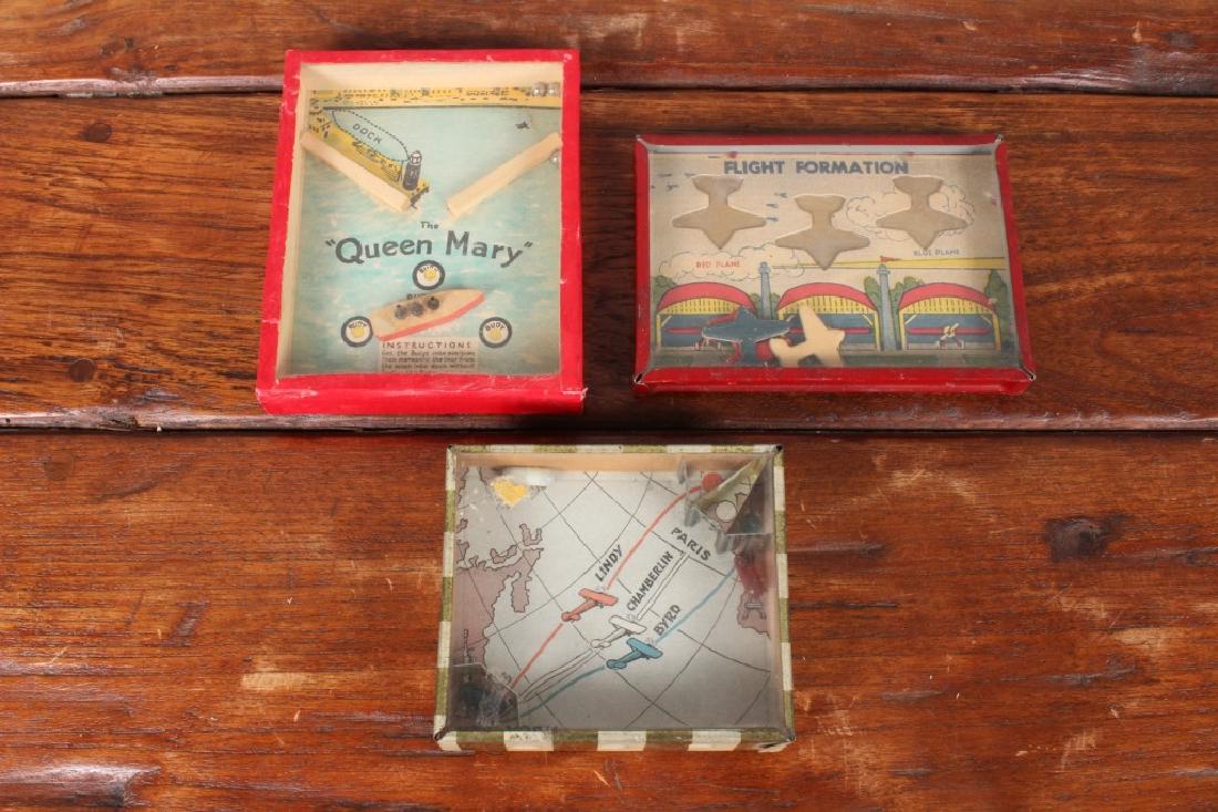 Lot Handheld Dexterity Ball Games: Lot Handheld Dexterity Ball Games. Travel related. Size: 5" x 4" x 1" largest.