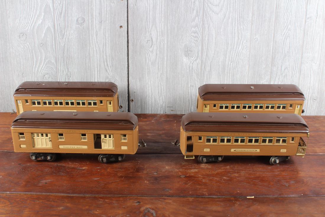 4 Lionel Pressed Steel Pullman Cars: 4 Lionel Pressed Steel Pullman Cars. Size: 5" x 14" x 3.5"