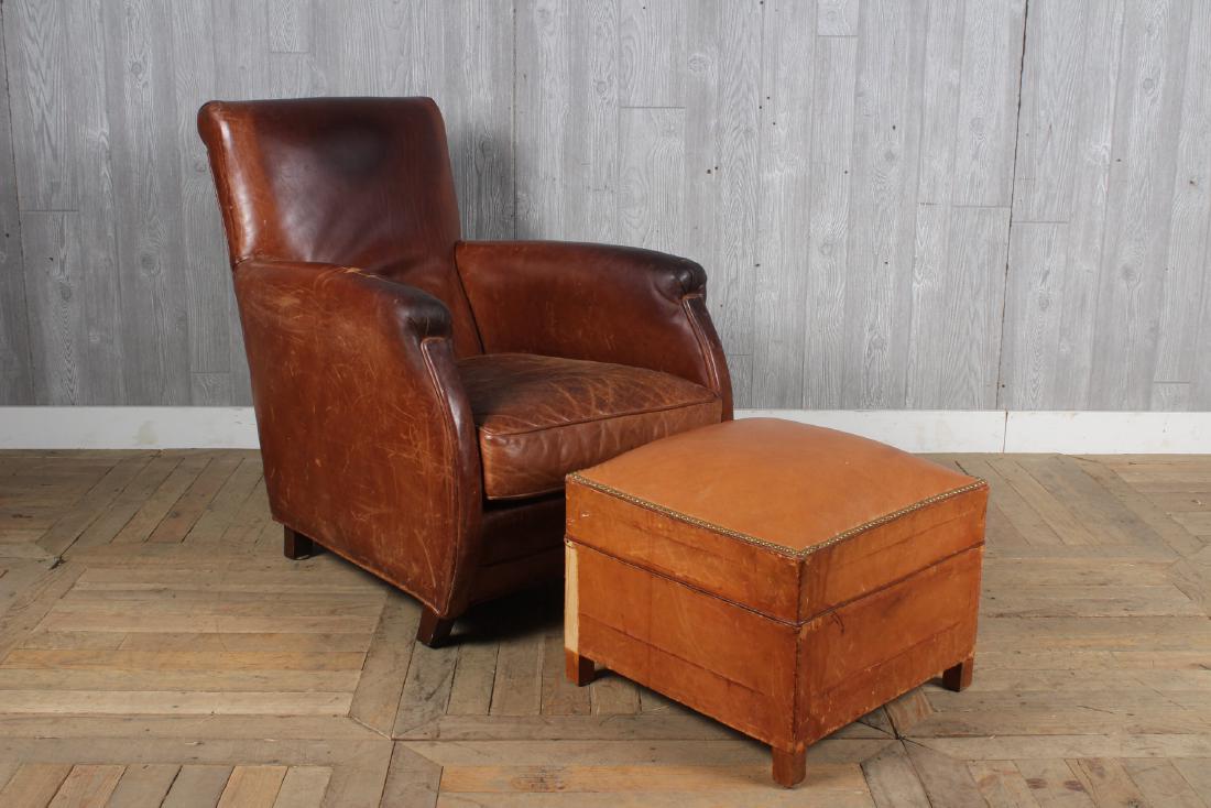 Leather Club Chair and Ottoman: Leather Club Chair and Ottoman. Size: 35" H x 29" W x 36" D