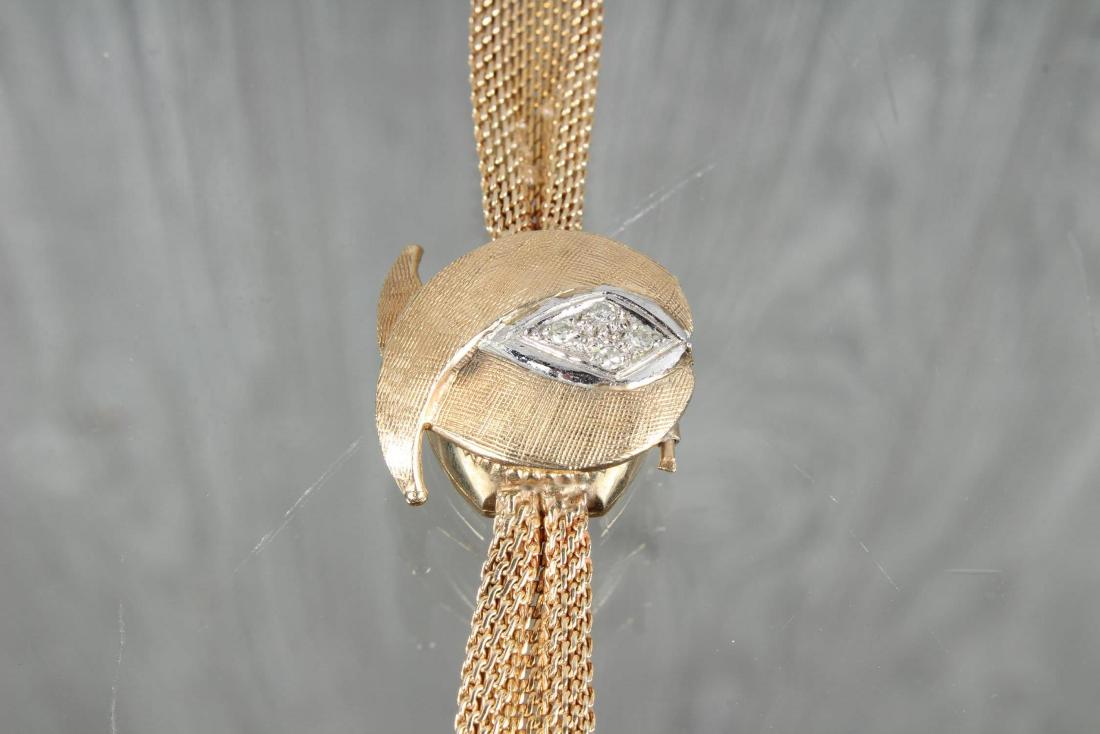 Libana 14K Gold and Diamond Locket Watch: Libana 14K Gold and Diamond Locket Watch. Total weight: 19g. Size: 7.5" L x 1" W