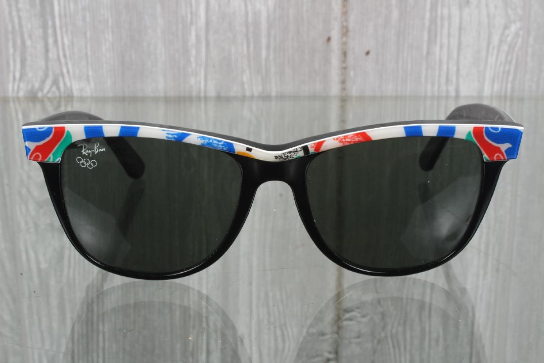 Ray Ban Barcelona Olympics Sunglasses: Ray Ban Barcelona Olympics Sunglasses. Size: 6.5" H x 3" W x 1" D