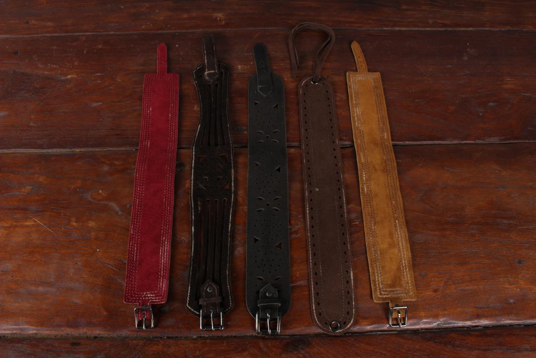 Group of YSL Leather Arm Bands: Group of YSL Leather Arm Bands. Size: Largest: 21" L x 2" W