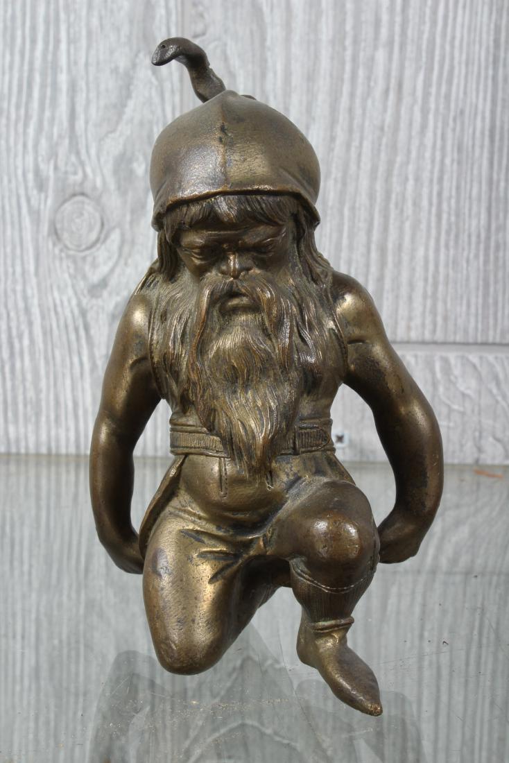Antique Figural Bronze Gnome: A turn of the century bronze sculpture of a kneeling gnome. Size: 6" H x 3.5" W x 3.5" D