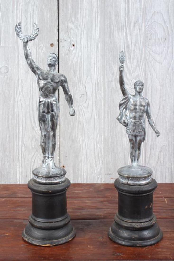 2 Vintage Trophies: 2 Vintage Trophies. Size: Largest: 17" H x 4" W x 4" D