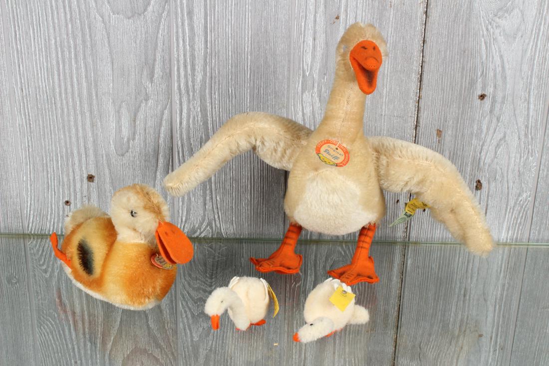 4 Vintage Steiff Waterfowl Plush Toys: Including Tulla Goose, with chest label, button and tag in ear. A mallard with chest label, and 2 swans with button and tag in ears. Size: Largest: 10" H x 12" W x 7.5" D