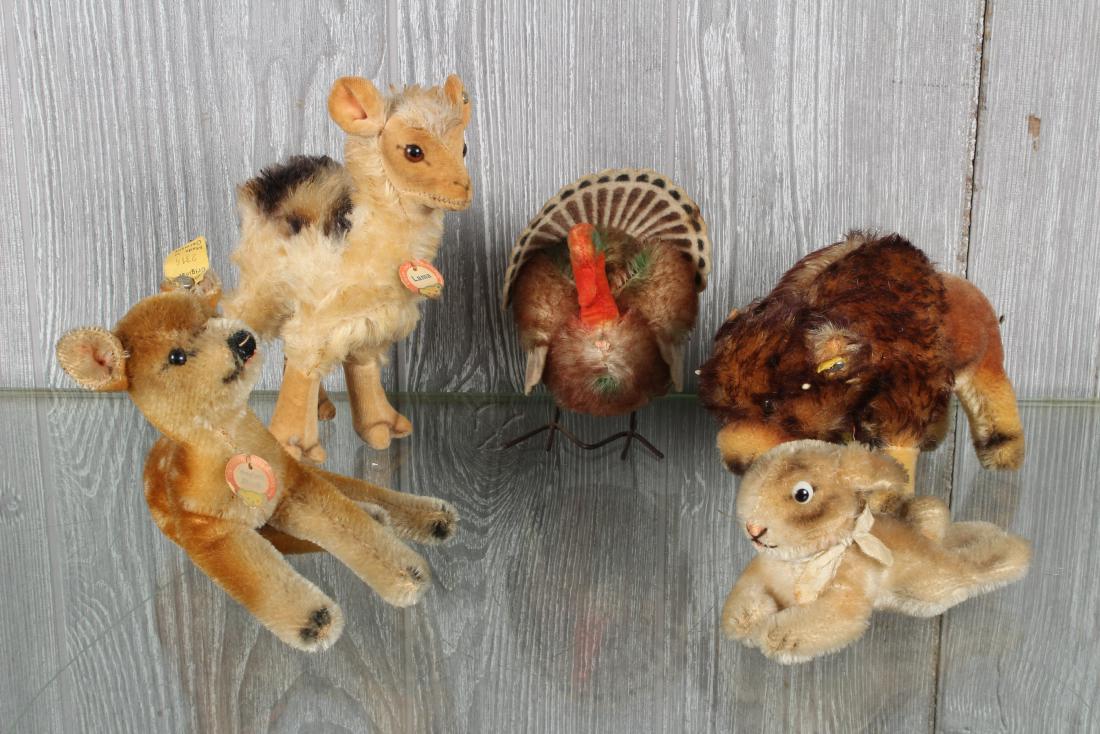 5 Vintage Steiff Americas Plush Fauna: Including Tucky with button and tag 1310, a fawn with chest label, numbered 2314, a leaping rabbit, Lama, with chest label and button, and Bison with chest label and button. Size: Largest: 6" H x 2.5"
