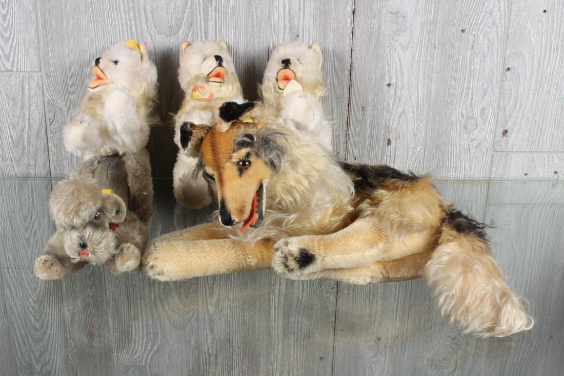5 Vintage Steiff Fancy Dog Plush Toys: Including Collie with chest label, button and tag 2343.00, Snobby the poodle with chest label, button and tag, and 3 Cosy Blanko, one with button and tag, with chest label, button and tag, and one wit