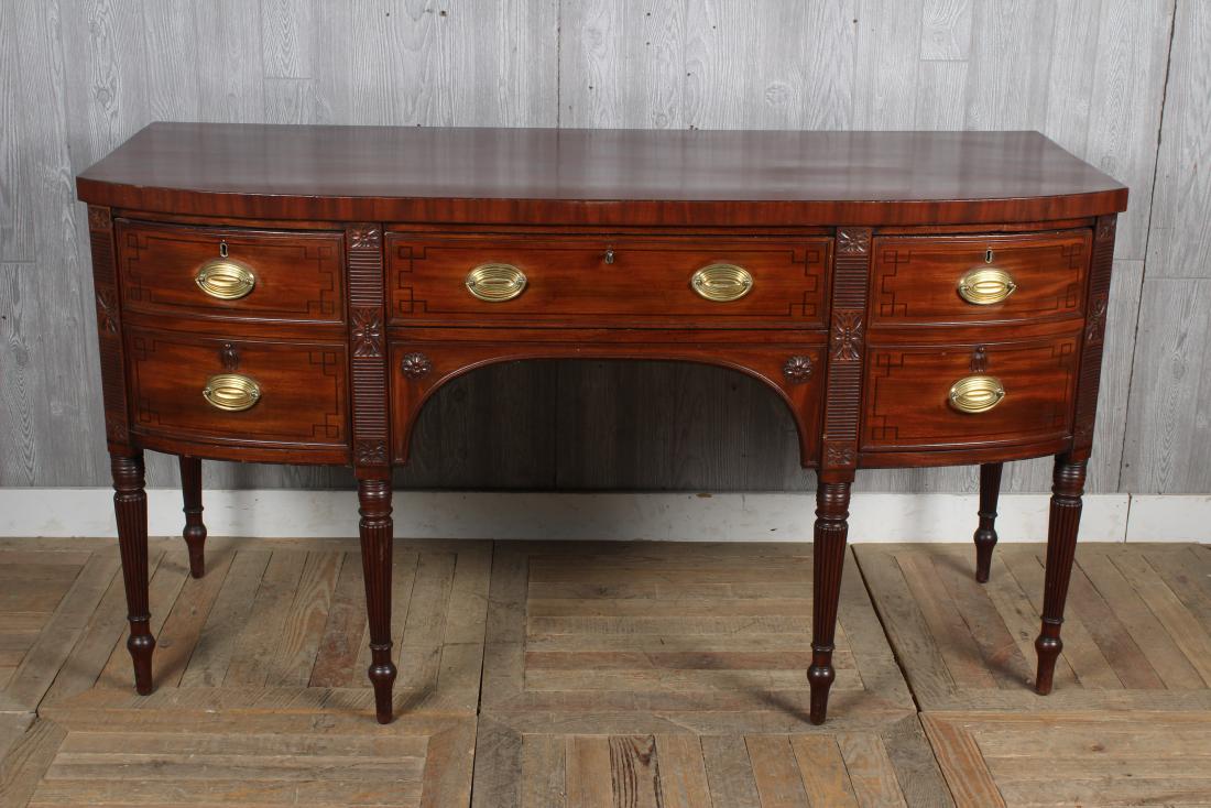 English Bow Front George III Style Sideboard: English Bow Front George III Style Sideboard. Size: 36.5" H x 66.5" W x 26.5" D