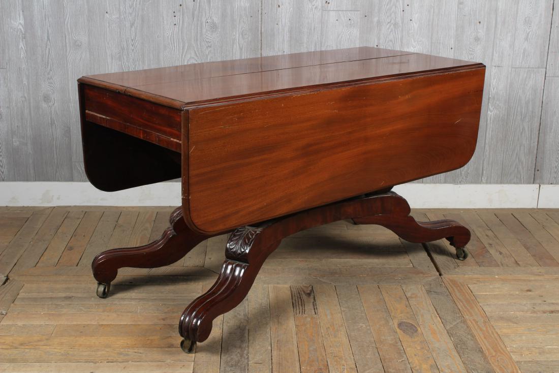 19th C. American Drop Leaf Extending Dining Table: 19th C. American Drop Leaf Extending Dining Table, with 3 leaves. Size: 29" H x 50" W x 24" D