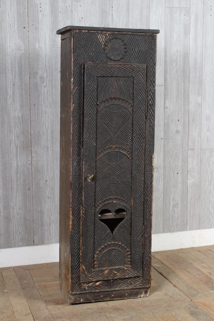 Turn Of The Century French Twig Cabinet: A turn of the century French rustic mosaic twig and pinecone decorated cabinet with a single door with star and heart designs. Size: 51" H x 17" W x 11" D