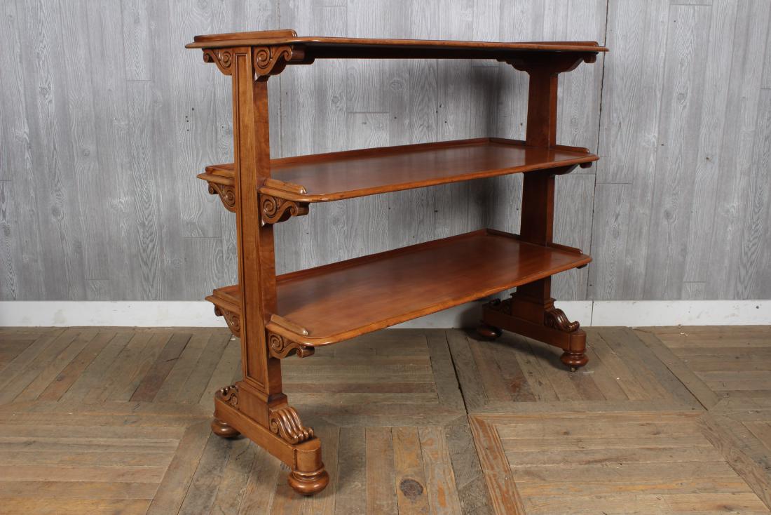 English William IV Style Mahogany Whatnot Shelf: English William IV style mahogany whatnot shelf having open shelves with scroll carved decoration. Size: 44" H x 48" W x 20" D