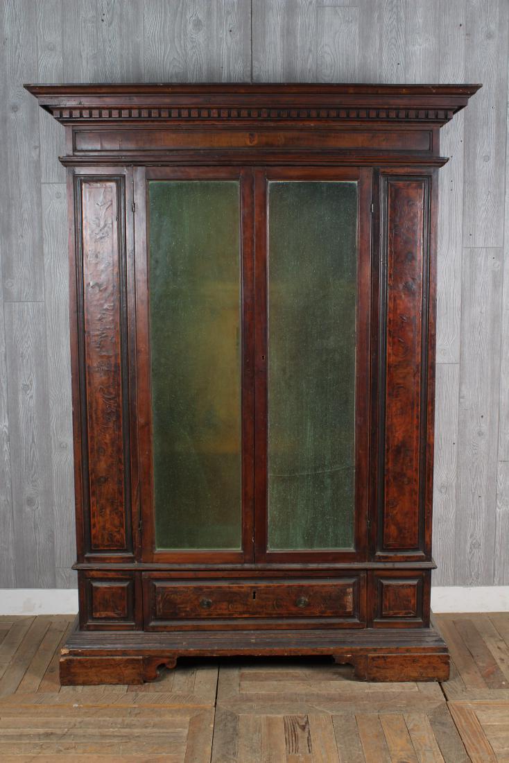 2 Door Armoire with Stepped Cornice: 2 Door Armoire with Stepped Cornice over 2 glass front doors. Size: 79" H x 57" W x 22" D
