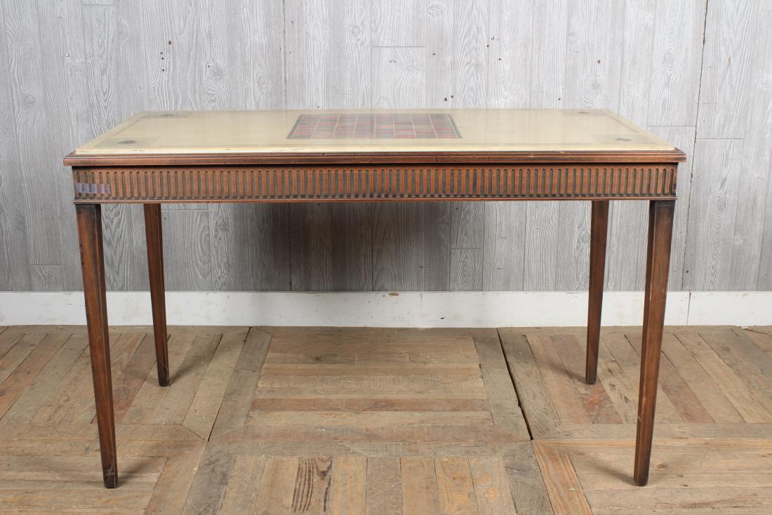 Marble Top Games Console Table: An interesting Neoclassical console table having a marble top with game board decoration over a carved skirt supported on tapered legs. Size: 28.5" H x 47" W x 23" D