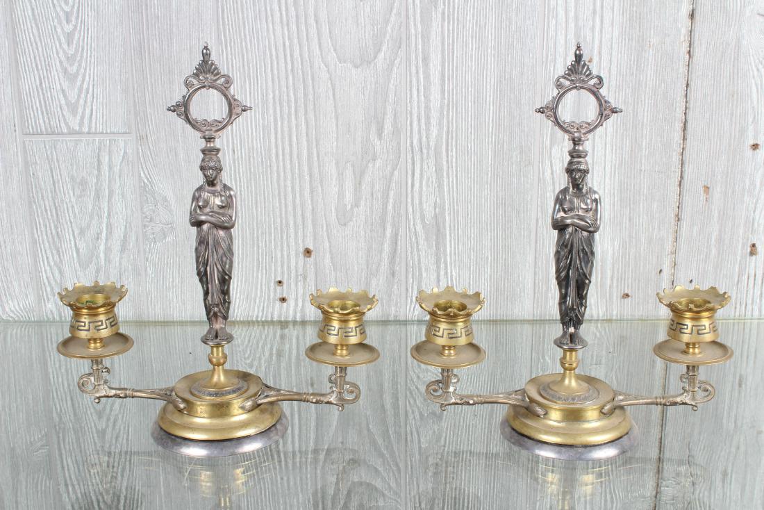 Pair Figural Neoclassical Candelabrum: Pair Figural Neoclassical Candelabrum, silver plate and bronze, standing maiden above double candle holders, Greek key pattern etched on holder. Size: 11" H x 8.5" W x 3.5" D