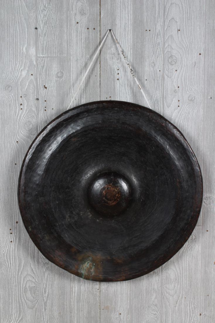 Indonesian Bronze Gamelan Gong: Indonesian Bronze Gamelan Gong. Size: 28.5" H x 28.5" W x 4" D