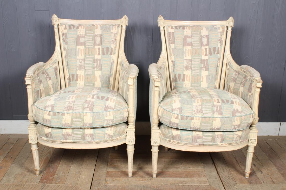 Pair Louis XVI Style Armchairs: Pair Louis XVI Style Armchairs. Painted carved wood and upholstered. Size: 36.5" H x 25.5" W x 25" D