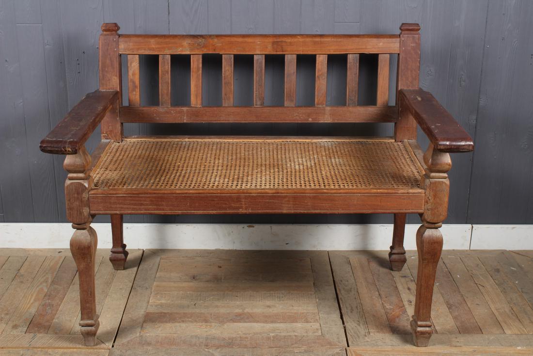 Carved and Caned Bench with Slat Back: Carved and Caned Bench with Slat Back and open arms. Size: 38" H x 48" W x 24" D