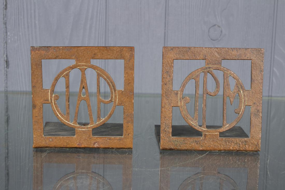 2 Deco Bronze Monogrammed Bookends: 2 Deco Bronze Monogrammed Bookends. One monogrammed JAP, other monogrammed JPM. Size: 4" H x 4" W x 4" D