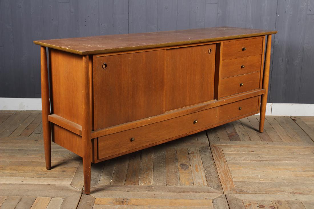 Pearsall Style Credenza: Pearsall Style Credenza. Two sliding doors above linen drawer, flanked by four drawers. Size: 30.5" H x 66" W x 19" D