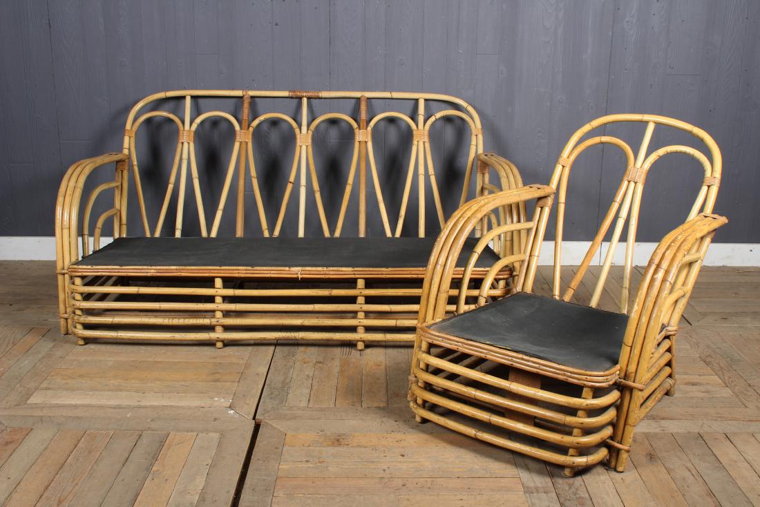 Rattan Sofa and Armchair: Rattan Sofa and Armchair. Size: 31" H x 65" W x 42" D