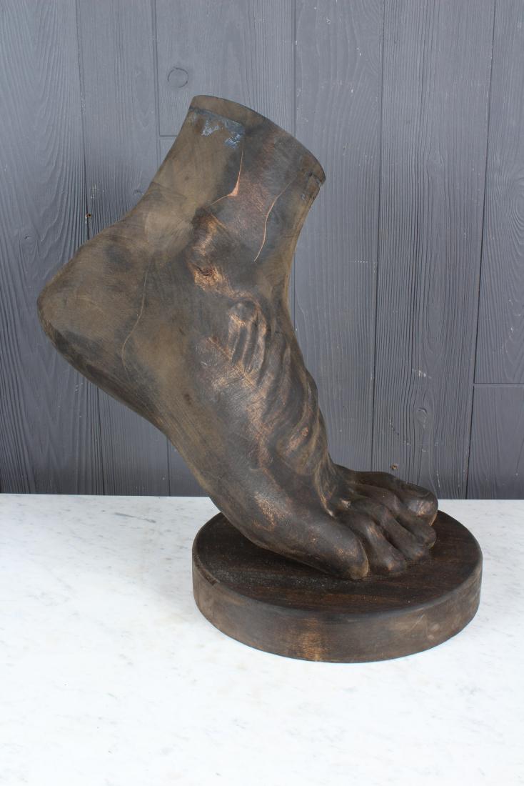 An Over Scaled Carved Wood Classical Foot: An Over Scaled Carved Wood Classical Foot resting on stand. Size: 19.5" H x 12" W x 17" D