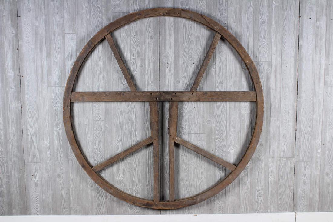 19th C Bell Tolling Wheel: A rare early 19th century wood tolling bell wheel of typical form. Size: 68" x 68" x 2.5"