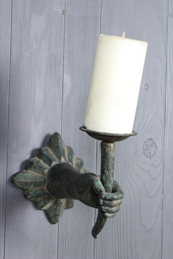 Verdigris Bronze Hand Form Pricket: Verdigris Bronze Pricket, wall sconce, outstretched arm holding pricket. Size: 8" H x 6" W x 9" D