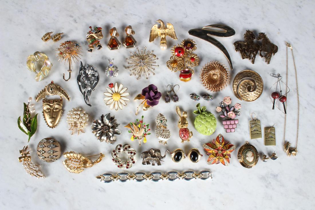 Assorted Costume Jewelry, Mostly Signed Pieces: Assorted Costume Jewelry, Mostly Signed Pieces. includes bracelets, earrings, brooches, and necklaces. 40 pieces, includes signed Michael Kors, Napier, D.Stewar, EXT, Trifari, Ultra Craft, Avon, RMN, 
