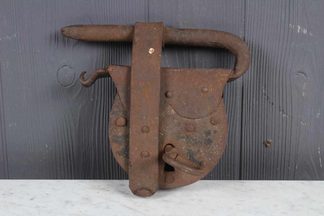 Large Iron Bar Lock: Large Iron Bar Lock with key. Size: 7" H x 8" W x 2.5" D