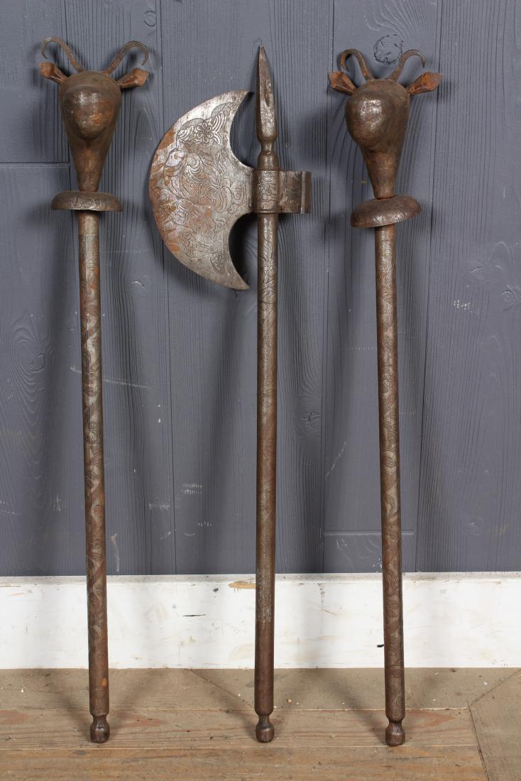 Lot 3 Persian Battle Axe and Bull Head Mace: Lot 3 Persian Battle Axe and Bull Head Mace, figural and floral engravings. Size: Largest: 27.5" H x 6.5" W x 1.5" D