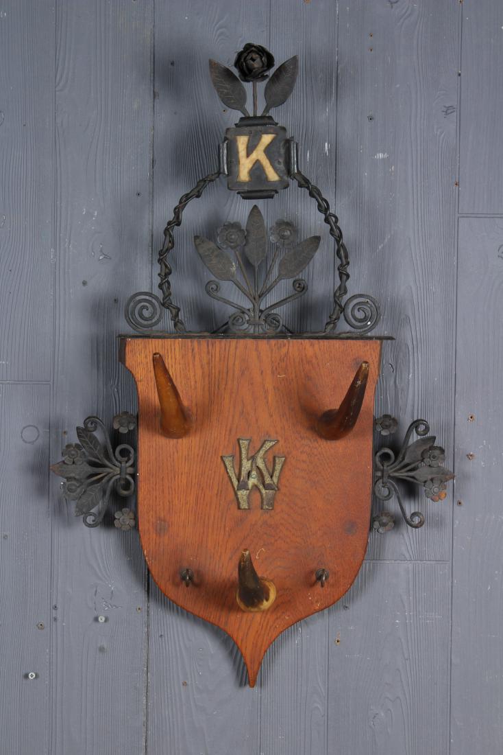 Folk Art Hall Rack: Folk Art Hall Rack. 3 horn form hooks, initialed K and KW in center, floral and scroll decoration. Size: 32.5" H x 20.5" W x 8" D