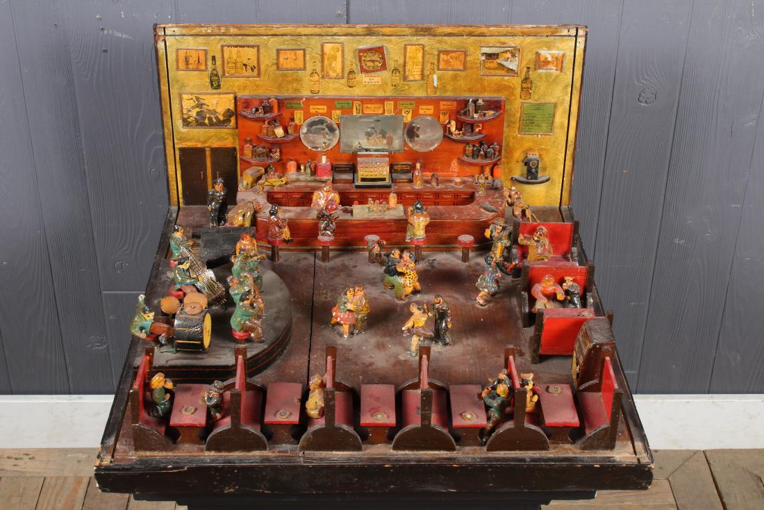 1940's Ceramic and Wood Bar Room Diorama: 1940's Ceramic and Wood Bar Room Diorama, detailed with patrons seated at the bar and in booths, there is a band playing on the stage with figures dancing on the floor, bottles and accessories. Size: