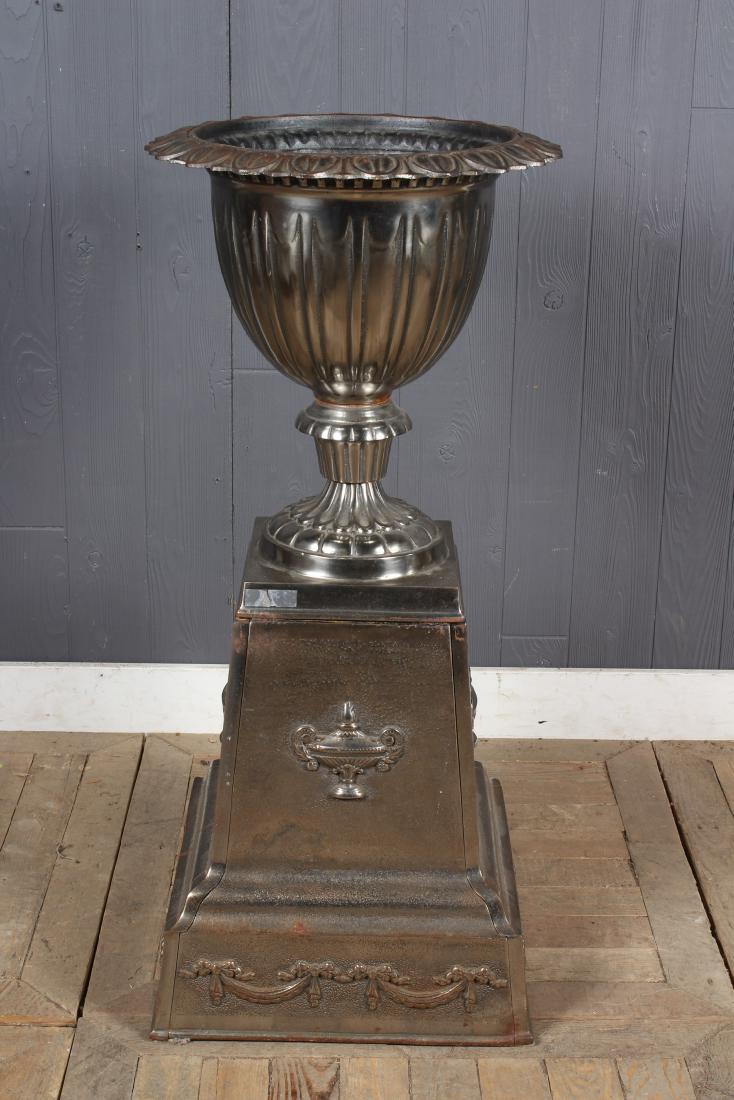 Polished Cast Iron Garden Urn Raised on Stand: Good Polished Cast Iron Garden Urn Raised on Stand. Size: 39" H x 17" W x 17" D