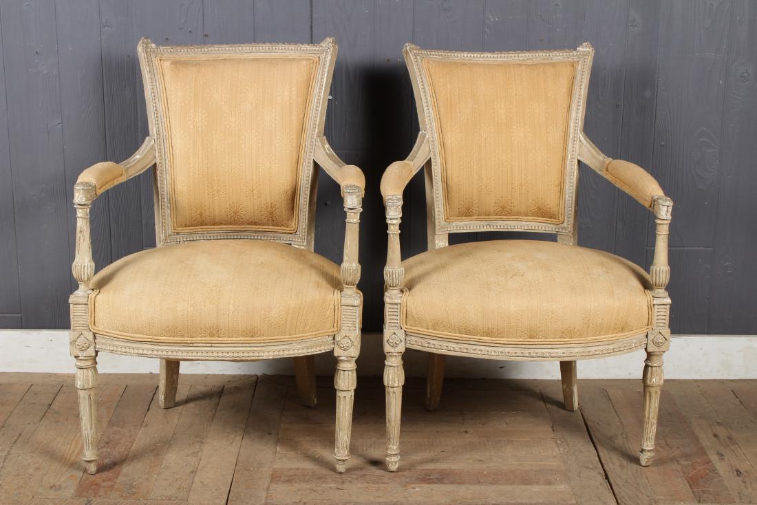 Pair Louis XVI Style Armchairs: Pair Louis XVI Style Armchairs. Carved open arms with upholstered seat and back. Size: 33" H x 22" W x 22" D