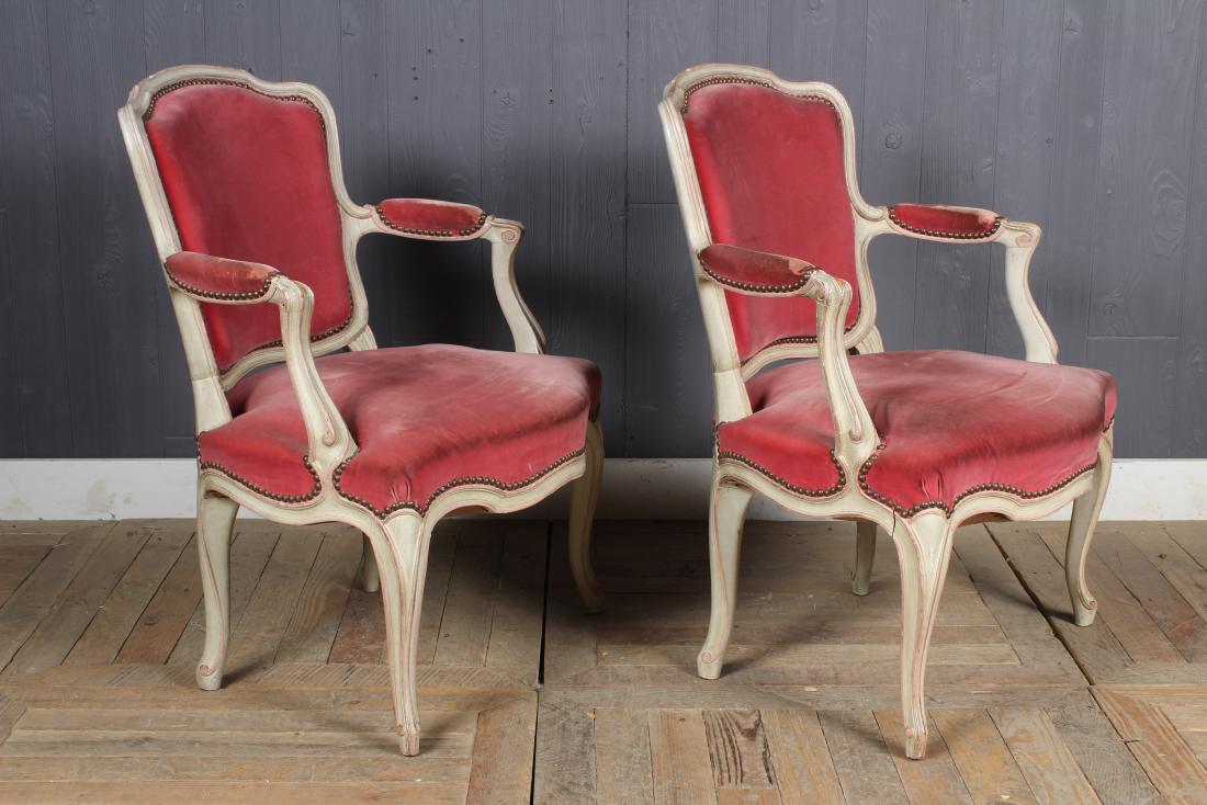 Pair Louis XV Style Carved and Painted Armchairs: A pair of French Louis XV style carved and painted armchairs. Size: 32.5" H x 24" W x 23" D