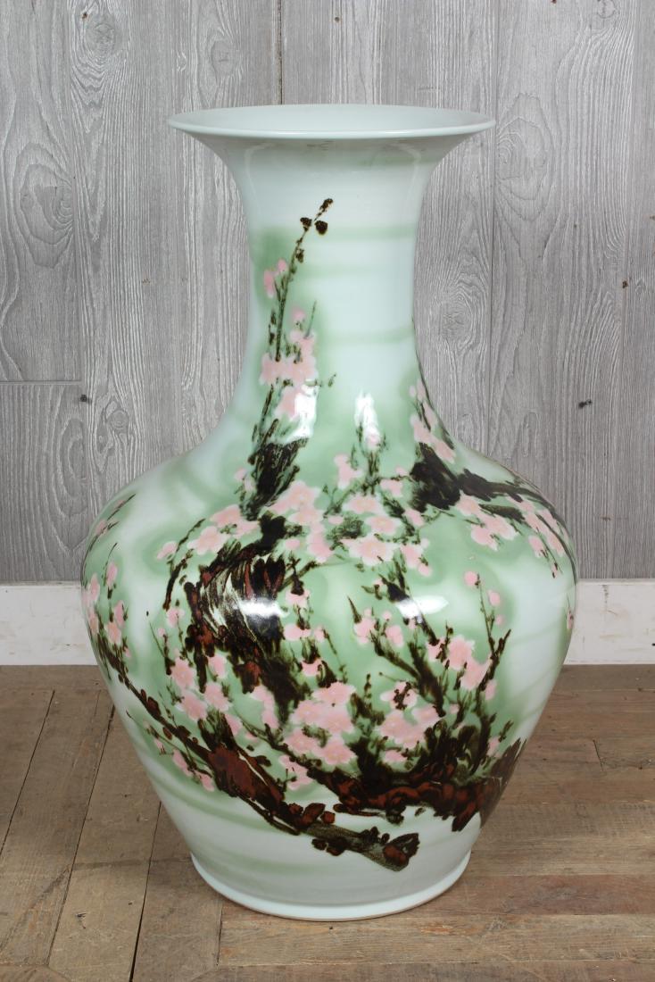 Large Chinese Porcelain Vase: Large Chinese Porcelain Vase, with celadon colored ground, floral decoration, signed on back. Size: 29.5" H x 17" W x 17" D