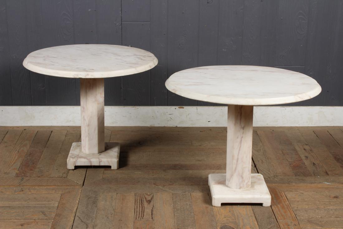 Pair of Carved Marble Side Tables: Pair of Carved Marble Side Tables with round tops and pedestal bases. Size: 19.5" H x 24" W x 24" D
